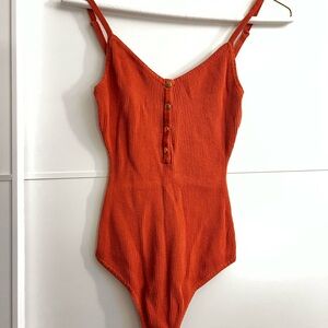 Orange Ribbed bodysuit